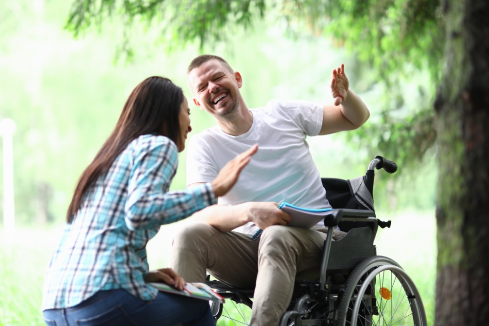 Male disabled man with girlfriend